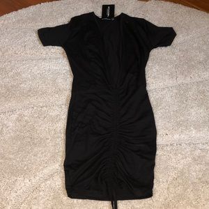 DEEP PLUNGE ROUCHED BLACK TSHIRT DRESS